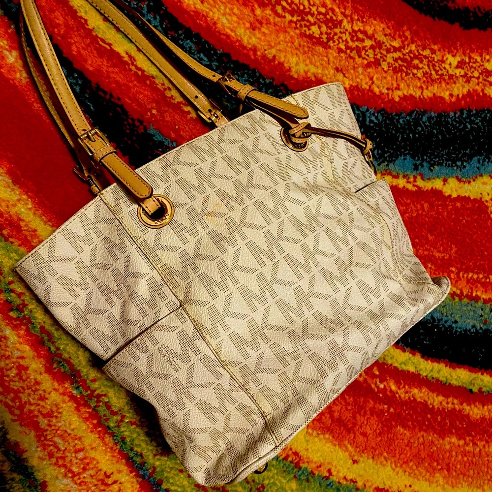 Authentic  Michael Kors med tote,  neutral, multi pockets great condition